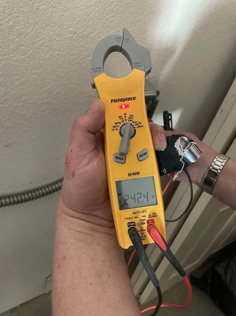 Voltage testing with clamp meter during Electrical Installation Services in Vacaville